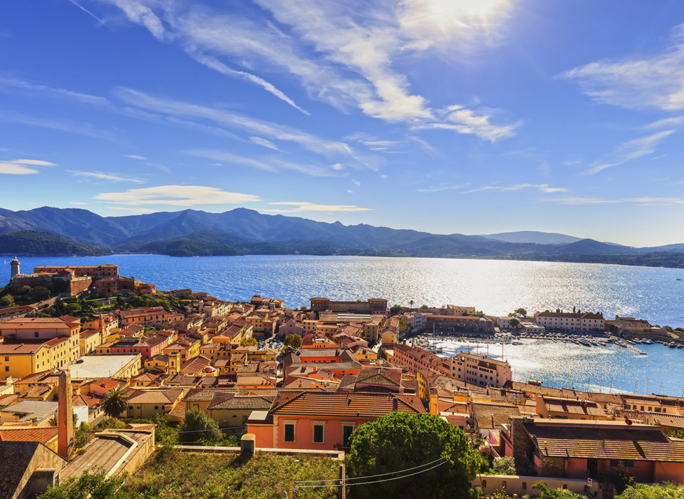 Aerial view of Elba island, lighthouse and fort. Tuscany, Italy.